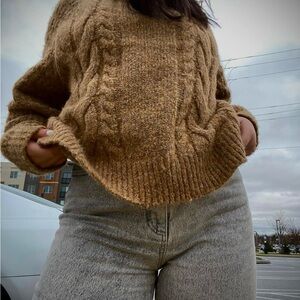 light brown cableknit sweater